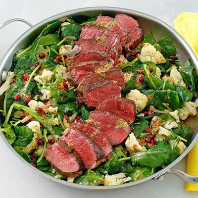 Beef Tenderloin With Roasted Cauliflower-Pomegranate Salad