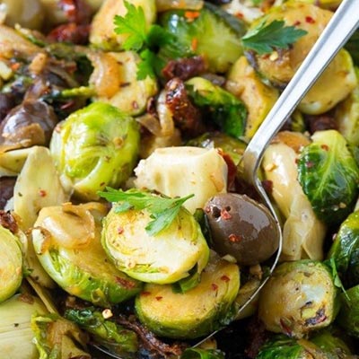 Braised Brussel Sprouts With Sun Dried Tomatoes Artichokes And Olives Recipe